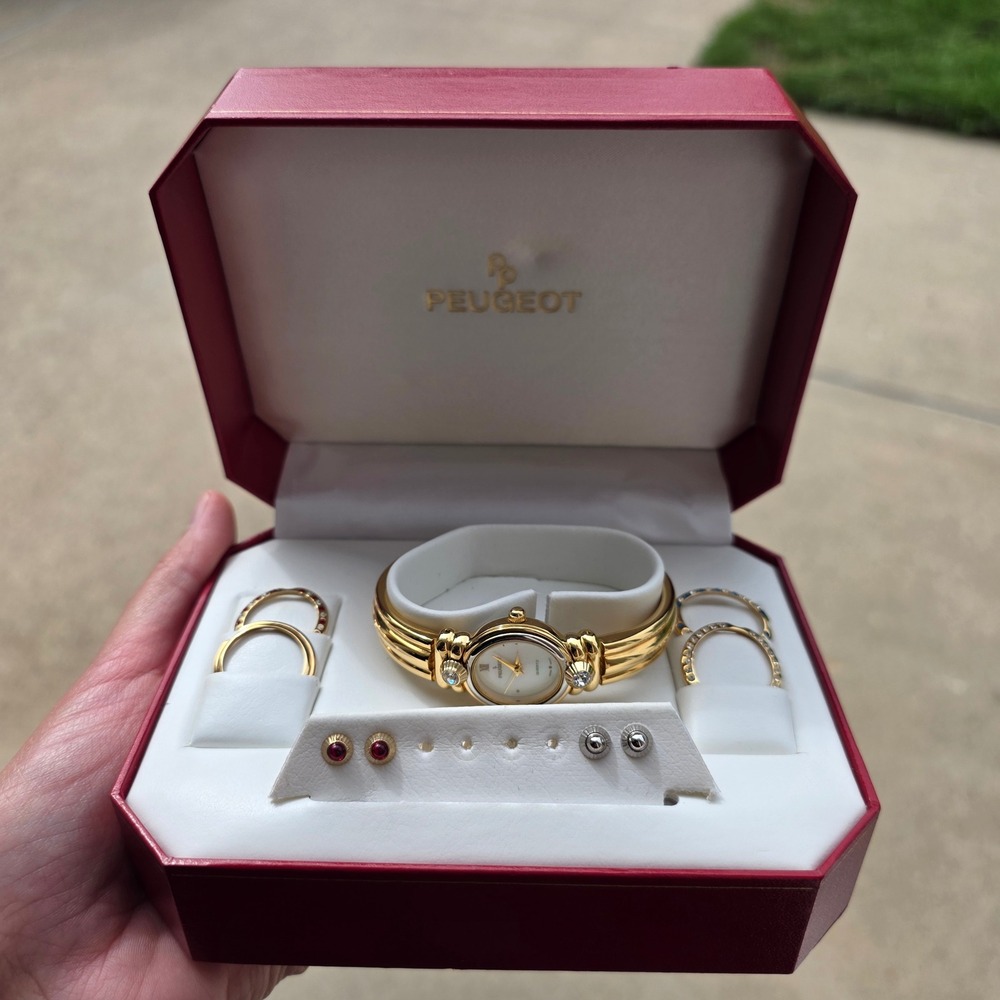 Vtg Peugeot Gold Tone Bangle Watch Set with Interchangeable Bezels and studs